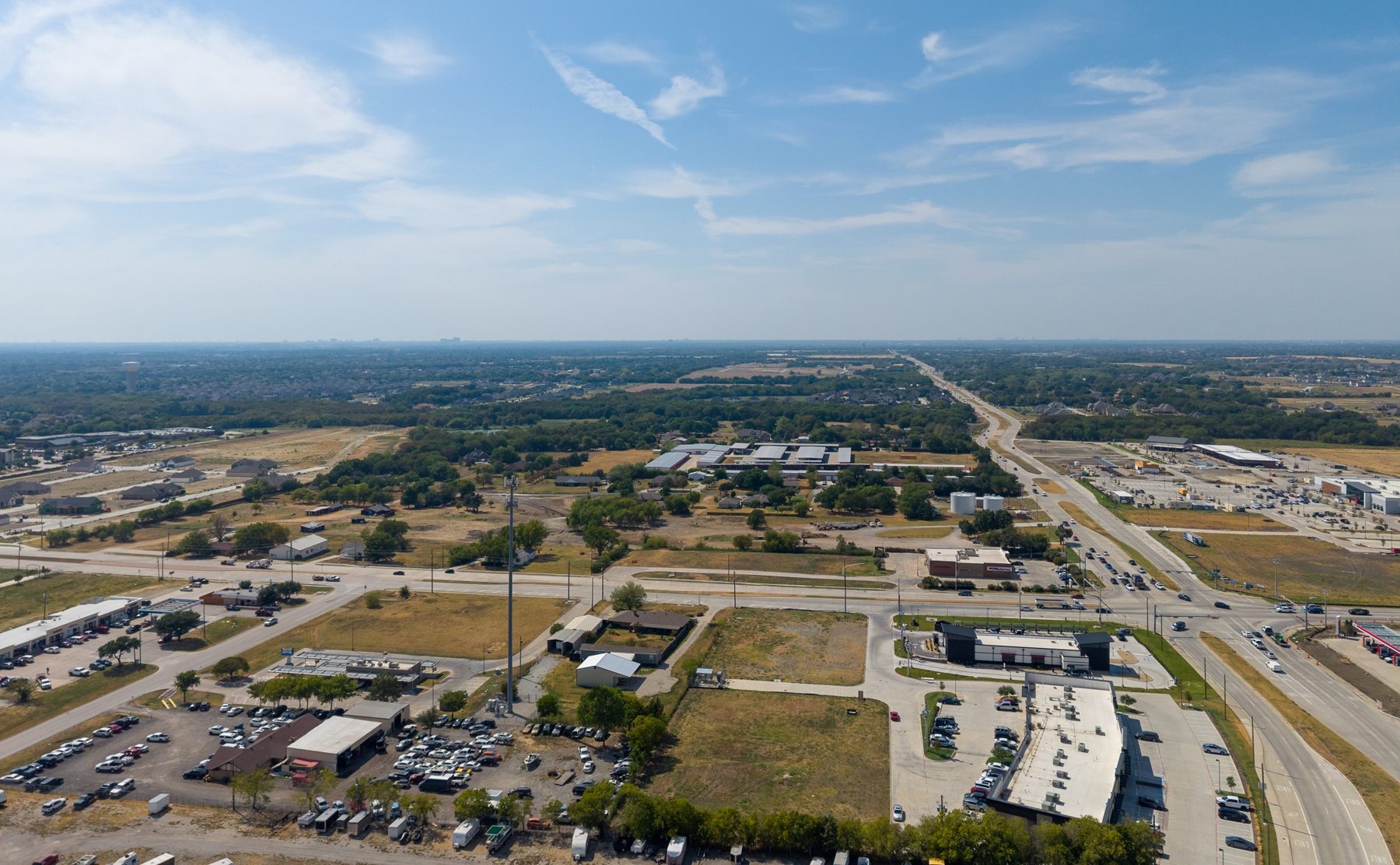 Wide aerial of the FM 1378 and FM 2514 corridor around Lot 4