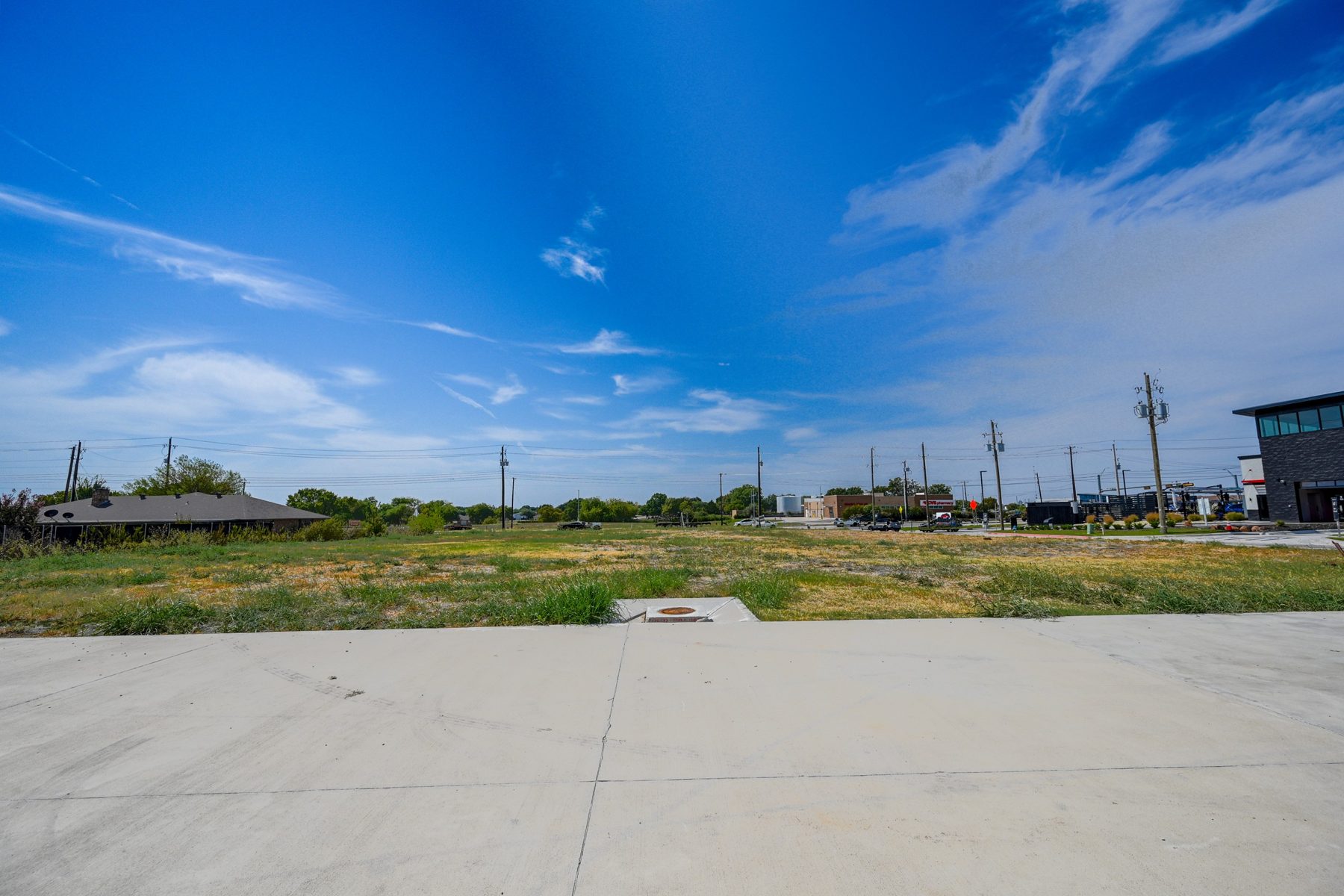 Ground-level view of the Lot 4 pad from the shared drive